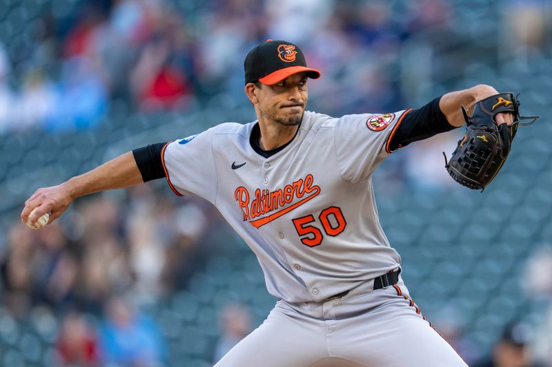 May 7, 2025; Minneapolis, Minnesota, USA; Baltimore Orioles starting pitcher Charlie Morton (50) delivers a pitch against the Minnesota Twins in the first inning at Target Field. Mandatory Credit: Jesse Johnson-Imagn Images