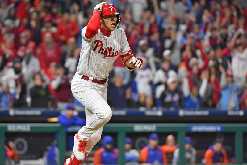 Sep 22, 2023; Philadelphia, Pennsylvania, USA; Philadelphia Phillies first baseman Alec Bohm (28) watches his walk-off single during the tenth inning against the New York Mets at Citizens Bank Park. Mandatory Credit: Eric Hartline-USA TODAY Sports