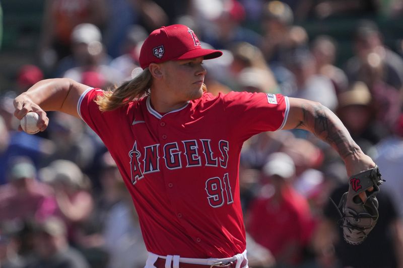 Mar 3, 2024; Tempe, Arizona, USA; Los Angeles Angels pitcher Caden Dana (91) pitches against the Chicago White Sox during the first inning at Tempe Diablo Stadium. Mandatory Credit: Joe Camporeale-USA TODAY Sports