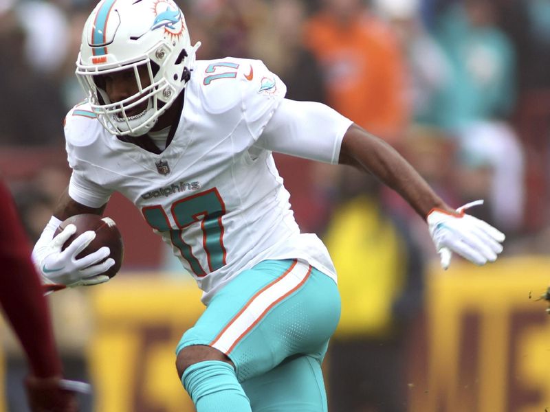 Miami Dolphins wide receiver Jaylen Waddle (17) runs during an NFL football game against the Washington Commanders, Sunday, December 03, 2023 in Landover, Md. (AP Photo/Daniel Kucin Jr.)