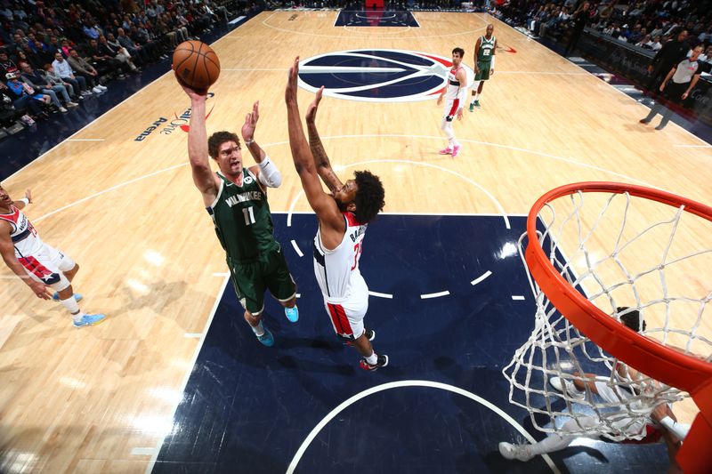 WASHINGTON, DC -? APRIL 2: Brook Lopez #11 of the Milwaukee Bucks shoots the ball during the game against the Washington Wizards on April 2, 2024 at Capital One Arena in Washington, DC. NOTE TO USER: User expressly acknowledges and agrees that, by downloading and or using this Photograph, user is consenting to the terms and conditions of the Getty Images License Agreement. Mandatory Copyright Notice: Copyright 2024 NBAE (Photo by Stephen Gosling/NBAE via Getty Images)