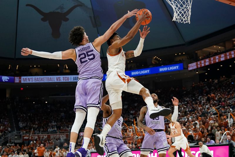 Jan 3, 2023; Austin, Texas, USA; Texas Longhorns guard Tyrese Hunter (4) drives to the basket against Kansas State Wildcats forward Ismael Massoud (25) during the first half at Moody Center. Mandatory Credit: Scott Wachter-USA TODAY Sports