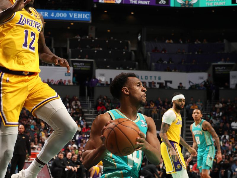 CHARLOTTE, NC - FEBRUARY 5: Ish Smith #14 of the Charlotte Hornets handles the ball during the game against the Los Angeles Lakers on February 5, 2024 at Spectrum Center in Charlotte, North Carolina. NOTE TO USER: User expressly acknowledges and agrees that, by downloading and or using this photograph, User is consenting to the terms and conditions of the Getty Images License Agreement. Mandatory Copyright Notice: Copyright 2024 NBAE (Photo by Kent Smith/NBAE via Getty Images)