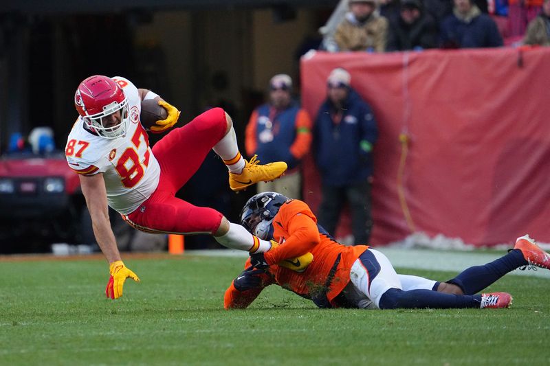 Kansas City Chiefs tight end Travis Kelce (87) against the Denver Broncos of an NFL football game Sunday October 29, 2023, in Denver. (AP Photo/Bart Young)