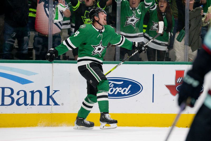 May 15, 2023; Dallas, Texas, USA; Dallas Stars center Roope Hintz (24) celebrates after he scores a goal on a breakaway shot against Seattle Kraken goaltender Philipp Grubauer (not pictured) during the second period in game seven of the second round of the 2023 Stanley Cup Playoffs at the American Airlines Center. Mandatory Credit: Jerome Miron-USA TODAY Sports