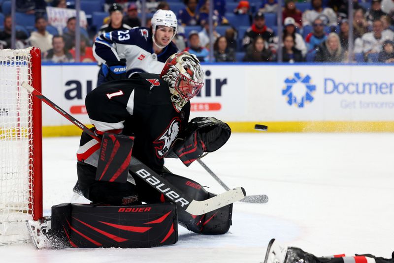 Mar 3, 2024; Buffalo, New York, USA;  Buffalo Sabres goaltender Ukko-Pekka Luukkonen (1) looks to make a save during the third period against the Winnipeg Jets at KeyBank Center. Mandatory Credit: Timothy T. Ludwig-USA TODAY Sports