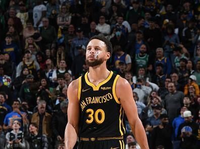 SAN FRANCISCO, CA - DECEMBER 19:  Stephen Curry #30 of the Golden State Warriors looks on during the game against the Boston Celtics on December 19, 2023 at Chase Center in San Francisco, California. NOTE TO USER: User expressly acknowledges and agrees that, by downloading and or using this photograph, user is consenting to the terms and conditions of Getty Images License Agreement. Mandatory Copyright Notice: Copyright 2023 NBAE (Photo by Noah Graham/NBAE via Getty Images)