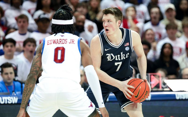 Jan 4, 2025; Dallas, Texas, USA;  Duke Blue Devils guard Kon Knueppel (7) controls the ball as Southern Methodist Mustangs guard B.J. Edwards (0) defends during the first half at Moody Coliseum. Mandatory Credit: Kevin Jairaj-Imagn Images