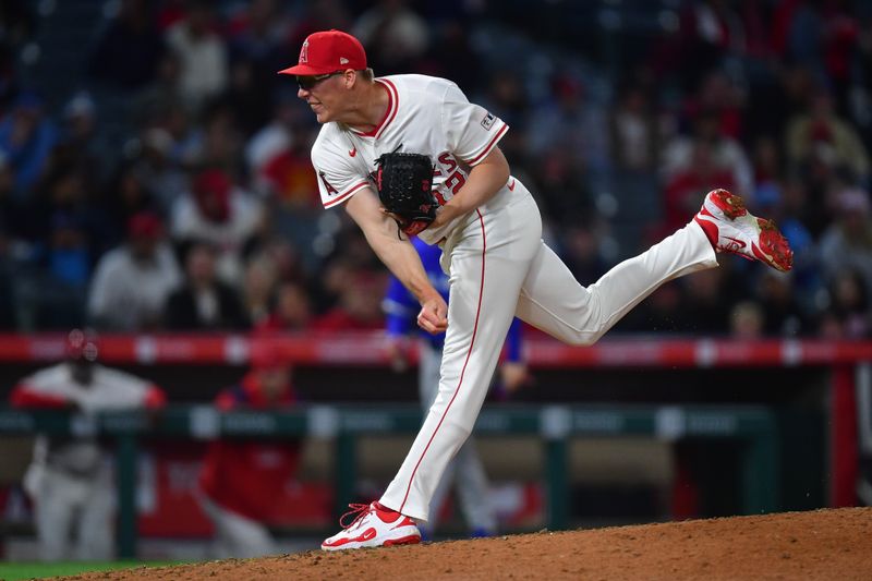 May 6, 2025; Anaheim, California, USA; Los Angeles Angels pitcher Ryan Johnson (32) throws against the Toronto Blue Jays during the seventh inning at Angel Stadium. Mandatory Credit: Gary A. Vasquez-Imagn Images