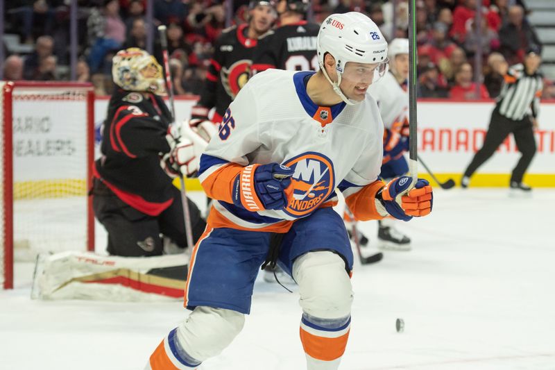 Nov 24, 2023; Ottawa, Ontario, CAN; New York Islanders right wing Oliver Wahlstrom (26) celebrates his goal scored in the second period against the Ottawa Senators at the Canadian Tire Centre. Mandatory Credit: Marc DesRosiers-USA TODAY Sports