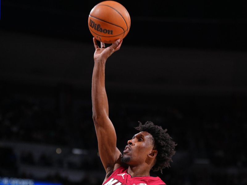 DENVER, CO - NOVEMBER 8: Josh Richardson #0 of the Miami Heat shoots the ball during the game against the Denver Nuggets on November 8, 2024 at Ball Arena in Denver, Colorado. NOTE TO USER: User expressly acknowledges and agrees that, by downloading and/or using this Photograph, user is consenting to the terms and conditions of the Getty Images License Agreement. Mandatory Copyright Notice: Copyright 2024 NBAE (Photo by Garrett Ellwood/NBAE via Getty Images)