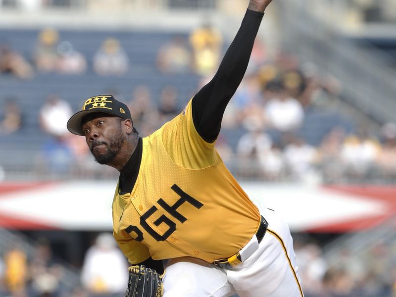 Jun 22, 2024; Pittsburgh, Pennsylvania, USA;  Pittsburgh Pirates relief pitcher Aroldis Chapman (45) pitches against the Tampa Bay Rays during the ninth inning at PNC Park. The Pirates won 4-3. Mandatory Credit: Charles LeClaire-USA TODAY Sports