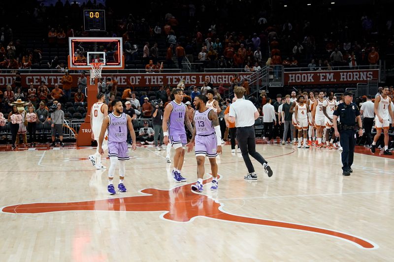 Jan 3, 2023; Austin, Texas, USA; Kansas State Wildcats guards Markquis Nowell (1) and Desi Sills react along with forward Keyontae Johnson (11) after an upset victory over the Texas Longhorns at Moody Center. Mandatory Credit: Scott Wachter-USA TODAY Sports