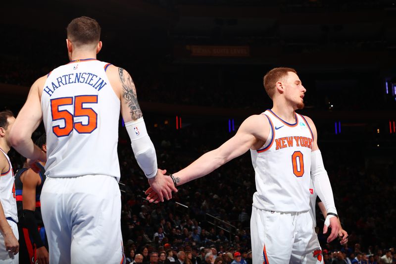 NEW YORK, NY - MARCH 25:  Isaiah Hartenstein #55 and Donte Divincenzo #0 of the New York Knicks react during the game against the Detroit Pistons on March 25, 2024 at Madison Square Garden in New York City, New York.  NOTE TO USER: User expressly acknowledges and agrees that, by downloading and or using this photograph, User is consenting to the terms and conditions of the Getty Images License Agreement. Mandatory Copyright Notice: Copyright 2024 NBAE  (Photo by David L. Nemec /NBAE via Getty Images)