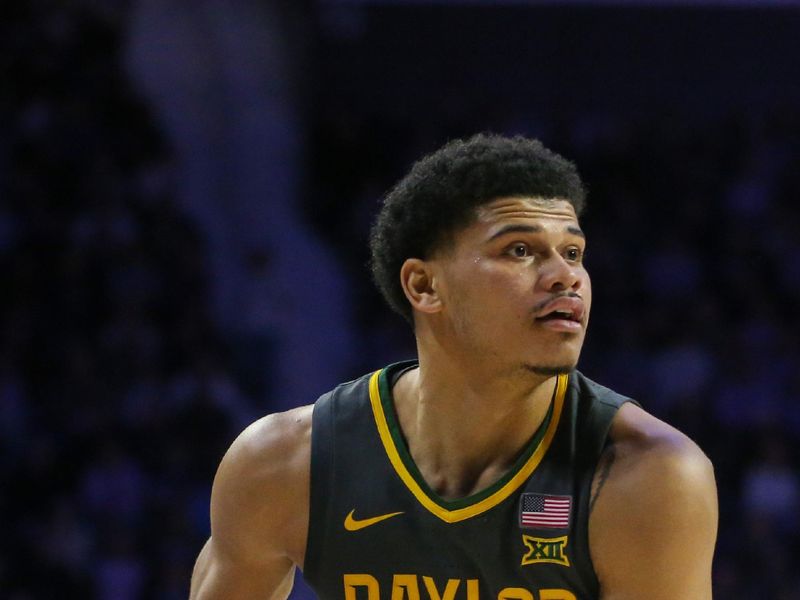 Jan 16, 2024; Manhattan, Kansas, USA; Baylor Bears guard RayJ Dennis (10) looks for someone to pass to during the second half against the Kansas State Wildcats  at Bramlage Coliseum. Mandatory Credit: Scott Sewell-USA TODAY Sports