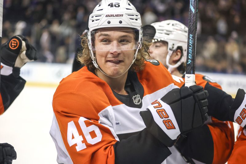 Feb 26, 2026; New York, New York, USA;  Philadelphia Flyers center Trevor Zegras (46) celebrates after defeating the New York Rangers in overtime at Madison Square Garden. Mandatory Credit: Wendell Cruz-Imagn Images