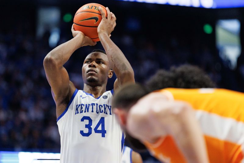 Feb 18, 2023; Lexington, Kentucky, USA; Kentucky Wildcats forward Oscar Tshiebwe (34) shoots a free throw during the second half against the Tennessee Volunteers at Rupp Arena at Central Bank Center. Mandatory Credit: Jordan Prather-USA TODAY Sports