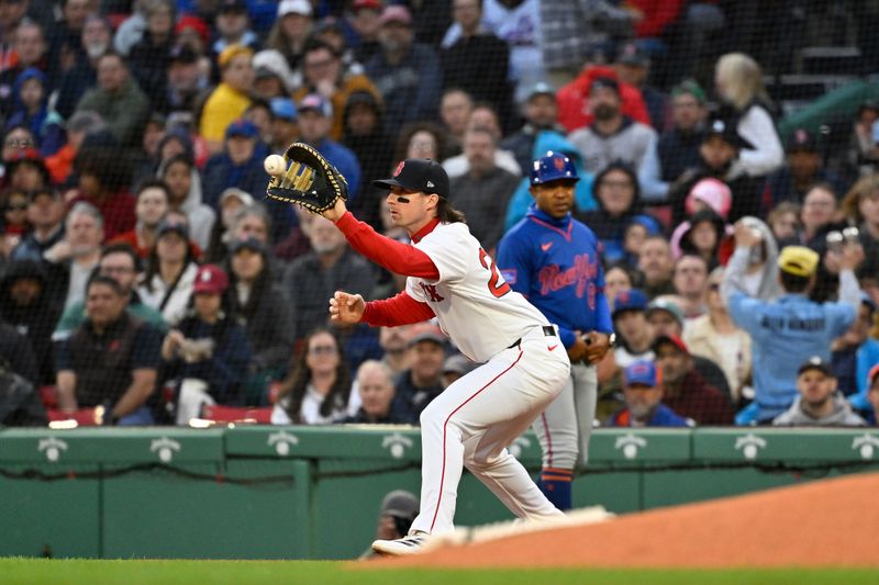 May 19, 2025; Boston, Massachusetts, USA; Boston Red Sox first baseman Nick Sogard (20) makes a catch for an out during the second inning against the New York Mets at Fenway Park. Mandatory Credit: Eric Canha-Imagn Images