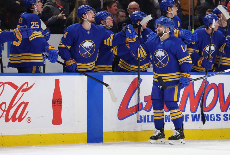 Jan 17, 2026; Buffalo, New York, USA;  Buffalo Sabres left wing Jason Zucker (17) celebrates his goal with teammates during the first period against the Minnesota Wild at KeyBank Center. Mandatory Credit: Timothy T. Ludwig-Imagn Images