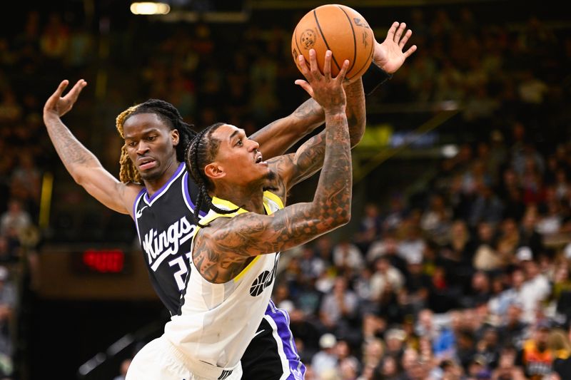 SALT LAKE CITY, UTAH - OCTOBER 15: Jordan Clarkson #00 of the Utah Jazz shoots in front of Keon Ellis #23 of the Sacramento Kings during the second half of a preseason game at Delta Center on October 15, 2024 in Salt Lake City, Utah. NOTE TO USER: User expressly acknowledges and agrees that, by downloading and or using this photograph, User is consenting to the terms and conditions of the Getty Images License Agreement. (Photo by Alex Goodlett/Getty Images)