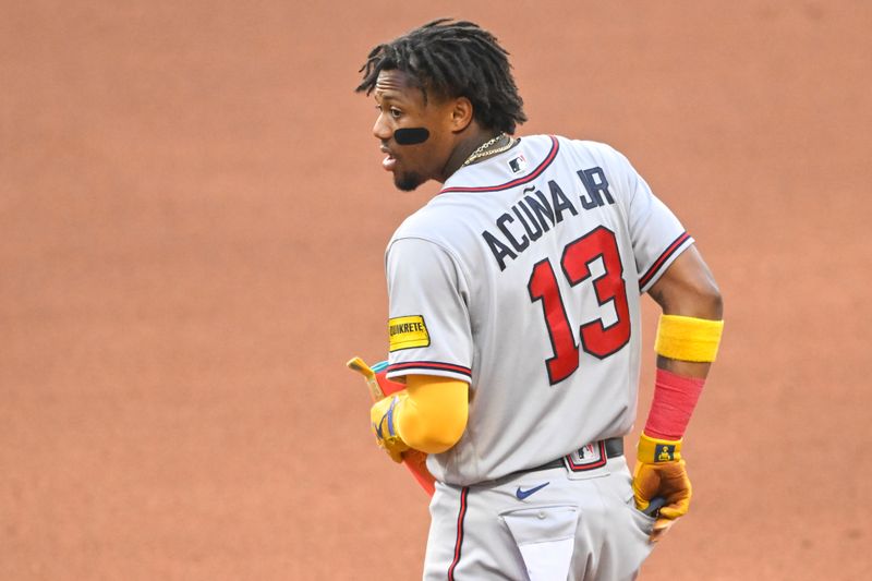 Jul 5, 2023; Cleveland, Ohio, USA; Atlanta Braves right fielder Ronald Acuna Jr. (13) stands on the field in the fourth inning against the Atlanta Braves at Progressive Field. Mandatory Credit: David Richard-USA TODAY Sports