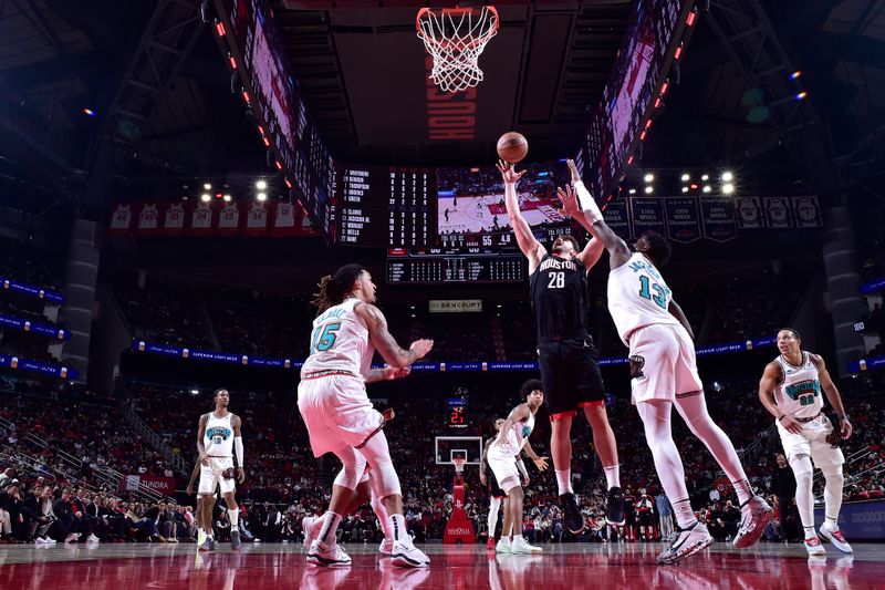 HOUSTON, TX - JANUARY 13:  Alperen Sengun #28 of the Houston Rockets shoots the ball during the game against the Memphis Grizzlies  on January 13, 2025 at the Toyota Center in Houston, Texas. NOTE TO USER: User expressly acknowledges and agrees that, by downloading and or using this photograph, User is consenting to the terms and conditions of the Getty Images License Agreement. Mandatory Copyright Notice: Copyright 2024 NBAE (Photo by Logan Riely/NBAE via Getty Images)