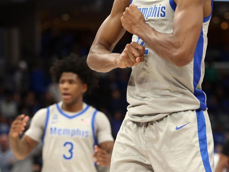 Feb 12, 2023; Memphis, Tennessee, USA; Memphis Tigers forward DeAndre Williams (12) reacts after a charge call during the second half against the Temple Owls at FedExForum. Mandatory Credit: Petre Thomas-USA TODAY Sports