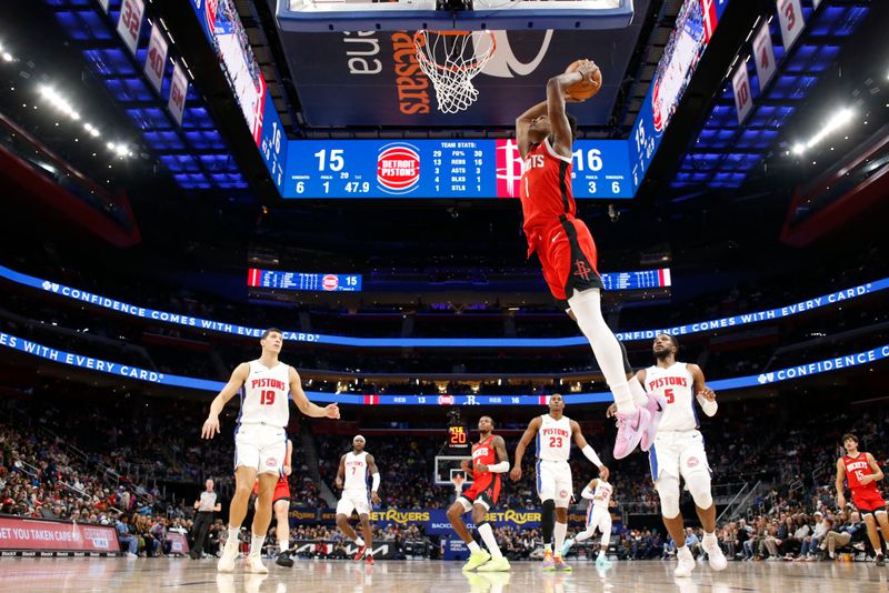 DETROIT, MI - NOVEMBER 10: Amen Thompson #1 of the Houston Rockets dunks the ball during the game against the Detroit Pistons on November 10, 2024 at Little Caesars Arena in Detroit, Michigan. NOTE TO USER: User expressly acknowledges and agrees that, by downloading and/or using this photograph, User is consenting to the terms and conditions of the Getty Images License Agreement. Mandatory Copyright Notice: Copyright 2024 NBAE (Photo by Brian Sevald/NBAE via Getty Images)