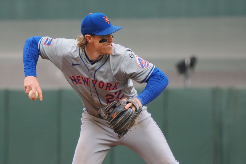 Apr 24, 2024; San Francisco, California, USA; New York Mets third baseman Brett Bailey (22) throws the ball to first base against the San Francisco Giants during the ninth inning at Oracle Park. Mandatory Credit: Kelley L Cox-USA TODAY Sports