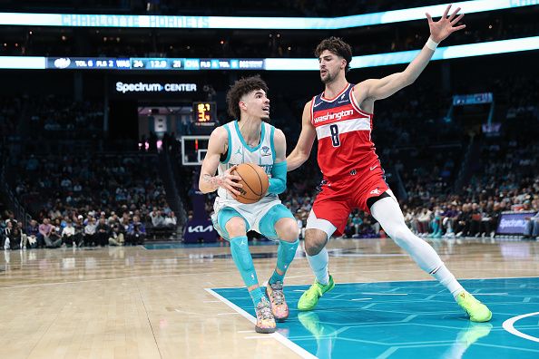 CHARLOTTE, NC - NOVEMBER 22: LaMelo Ball #1 of the Charlotte Hornets drives to the basket during the game against the Washington Wizards on November 22, 2023 at Spectrum Center in Charlotte, North Carolina. NOTE TO USER: User expressly acknowledges and agrees that, by downloading and or using this photograph, User is consenting to the terms and conditions of the Getty Images License Agreement.  Mandatory Copyright Notice:  Copyright 2023 NBAE (Photo by Brock Williams-Smith/NBAE via Getty Images)