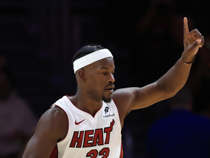 MIAMI, FLORIDA - OCTOBER 23: Jimmy Butler #22 of the Miami Heat reacts to a basket against the Orlando Magic during the second half at Kaseya Center on October 23, 2024 in Miami, Florida. NOTE TO USER: User expressly acknowledges and agrees that, by downloading and or using this photograph, User is consenting to the terms and conditions of the Getty Images License Agreement. (Photo by Carmen Mandato/Getty Images)