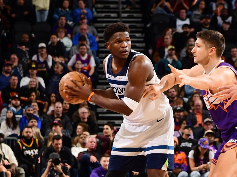 PHOENIX, AZ - JANUARY 29: Anthony Edwards #5 of the Minnesota Timberwolves looks to pass the ball during the game against the Phoenix Suns on January 29, 2025 at Footprint Center in Phoenix, Arizona. NOTE TO USER: User expressly acknowledges and agrees that, by downloading and or using this photograph, user is consenting to the terms and conditions of the Getty Images License Agreement. Mandatory Copyright Notice: Copyright 2025 NBAE (Photo by Kate Frese/NBAE via Getty Images)