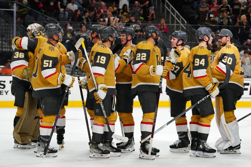 Sep 29, 2023; Las Vegas, Nevada, USA; Vegas Golden Knights players celebrate after defeating the Arizona Coyotes 3-1 in a preseason game at T-Mobile Arena. Mandatory Credit: Stephen R. Sylvanie-USA TODAY Sports