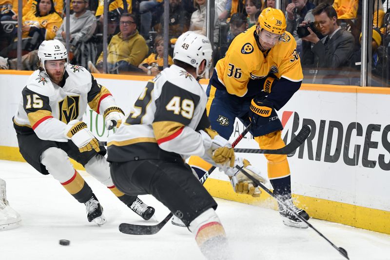 Mar 26, 2024; Nashville, Tennessee, USA; Nashville Predators left wing Cole Smith (36) passes the puck against Vegas Golden Knights defenseman Noah Hanifin (15) and center Ivan Barbashev (49) during the first period at Bridgestone Arena. Mandatory Credit: Christopher Hanewinckel-USA TODAY Sports