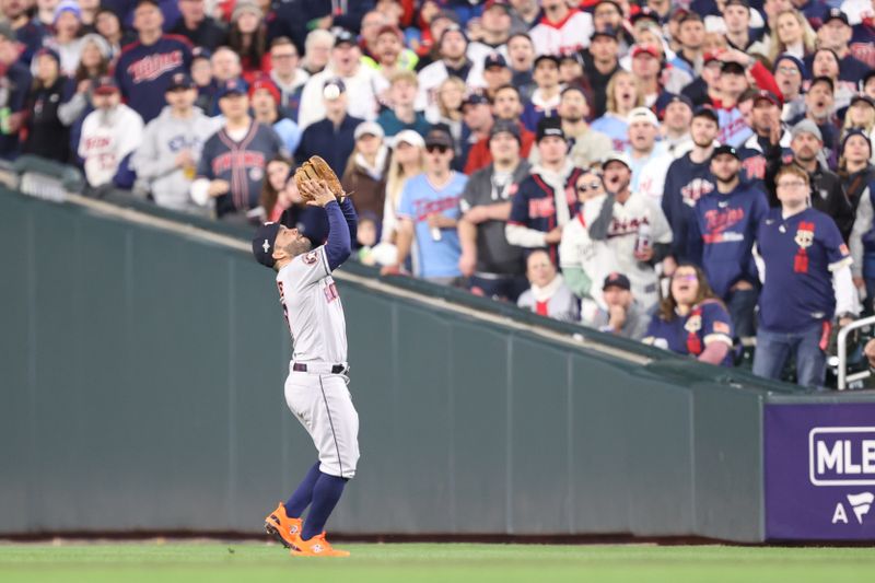 Oct 11, 2023; Minneapolis, Minnesota, USA; Houston Astros second baseman Jose Altuve (27) catches fly ball in the fifth inning against the Minnesota Twins during game four of the ALDS for the 2023 MLB playoffs at Target Field. Mandatory Credit: Jesse Johnson-USA TODAY Sports