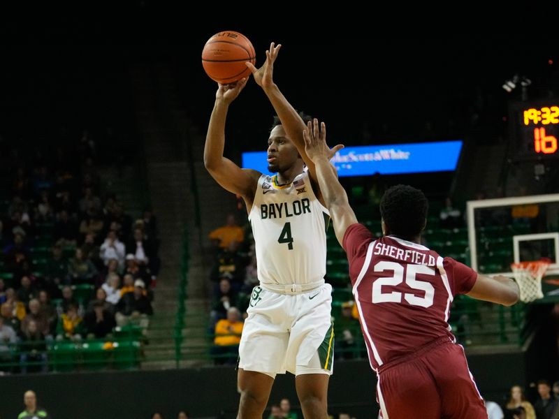 Feb 8, 2023; Waco, Texas, USA;  Baylor Bears guard LJ Cryer (4) scores a three point basket over Oklahoma Sooners guard Grant Sherfield (25) during the first half at Ferrell Center. Mandatory Credit: Chris Jones-USA TODAY Sports