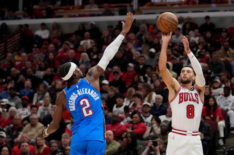 CHICAGO, ILLINOIS - OCTOBER 26: Zach LaVine #8 of the Chicago Bulls shoots the ball against Shai Gilgeous-Alexander #2 of the Oklahoma City Thunder in the third quarter during a game at the United Center on October 26, 2024 in Chicago, Illinois. NOTE TO USER: User expressly acknowledges and agrees that, by downloading and or using this photograph, User is consenting to the terms and conditions of the Getty Images License Agreement. (Photo by Patrick McDermott/Getty Images)