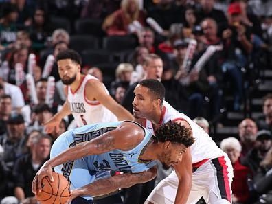 PORTLAND, OR - NOVEMBER 5: Marcus Smart #36 of the Memphis Grizzlies handles the ball against former Boston Celtics teammate Malcolm Brogdon #11 of the Portland Trail Blazers during the game on November 5, 2023 at the Moda Center Arena in Portland, Oregon. NOTE TO USER: User expressly acknowledges and agrees that, by downloading and or using this photograph, user is consenting to the terms and conditions of the Getty Images License Agreement. Mandatory Copyright Notice: Copyright 2023 NBAE (Photo by Cameron Browne/NBAE via Getty Images)