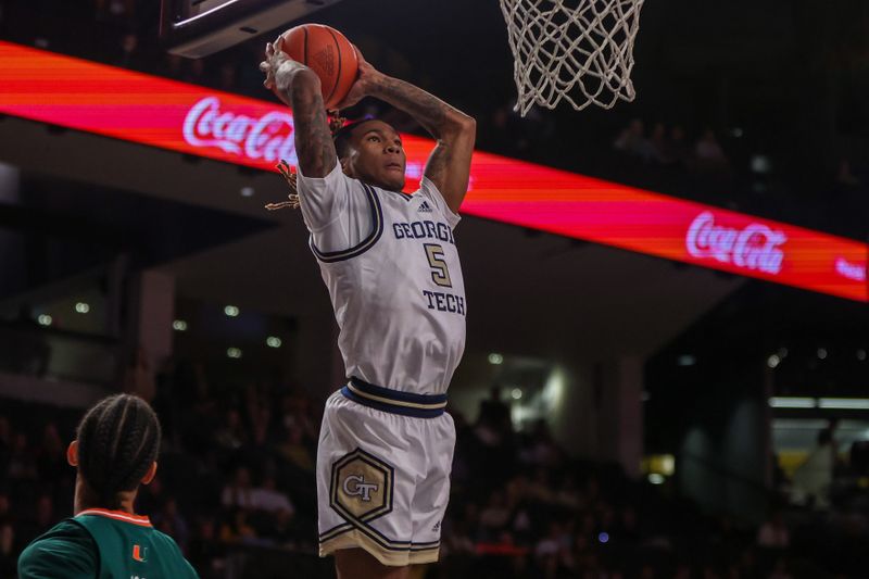 Jan 4, 2023; Atlanta, Georgia, USA; Georgia Tech Yellow Jackets guard Deivon Smith (5) dunks against the Miami Hurricanes in the second half at McCamish Pavilion. Mandatory Credit: Brett Davis-USA TODAY Sports