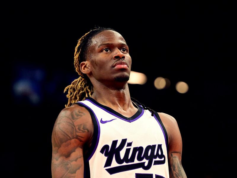 PHOENIX, AZ - MARCH 14:  Keon Ellis #23 of the Sacramento Kings looks on during the game against the Phoenix Suns  on March 14, 2025 at Footprint Center in Phoenix, Arizona. NOTE TO USER: User expressly acknowledges and agrees that, by downloading and or using this photograph, user is consenting to the terms and conditions of the Getty Images License Agreement. Mandatory Copyright Notice: Copyright 2025 NBAE (Photo by Kate Frese/NBAE via Getty Images)