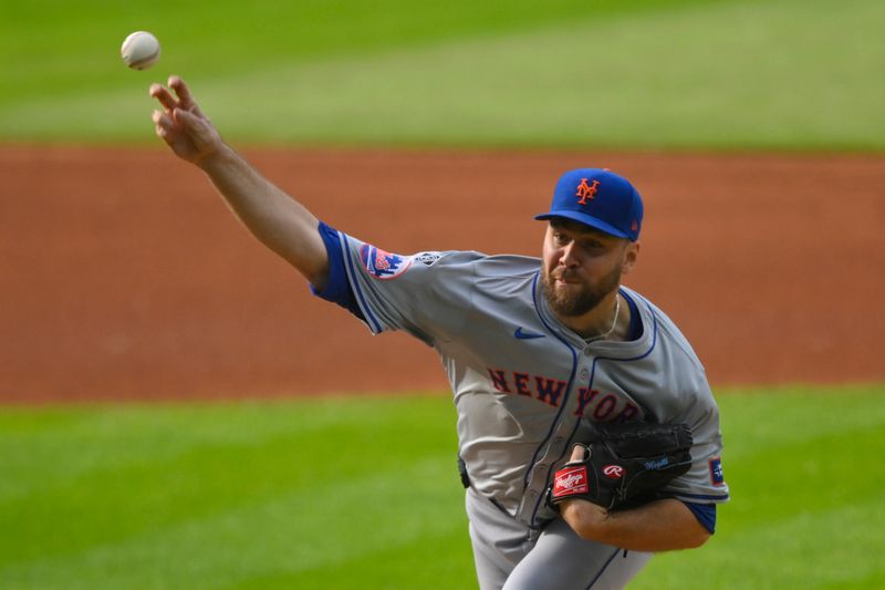 May 20, 2024; Cleveland, Ohio, USA; New York Mets starting pitcher Tylor Megill (38) delivers a pitch in the first inning against the Cleveland Guardians at Progressive Field. Mandatory Credit: David Richard-USA TODAY Sports