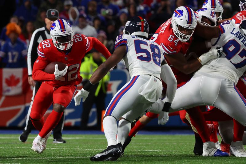 Buffalo Bills running back Damien Harris (22) carries the ball during the first half of an NFL football game against the New York Giants in Orchard Park, N.Y., Sunday Oct. 15, 2023. (AP Photo/ Jeffrey T. Barnes)