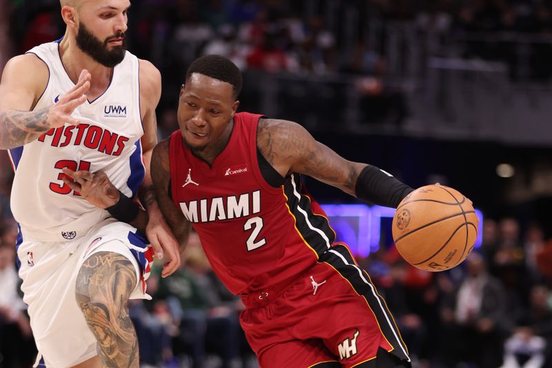 DETROIT, MICHIGAN - MARCH 17: Terry Rozier #2 of the Miami Heat drives to the basket against Evan Fournier #31 of the Detroit Pistons during the first half at Little Caesars Arena on March 17, 2024 in Detroit, Michigan. NOTE TO USER: User expressly acknowledges and agrees that, by downloading and or using this photograph, User is consenting to the terms and conditions of the Getty Images License.  (Photo by Gregory Shamus/Getty Images)