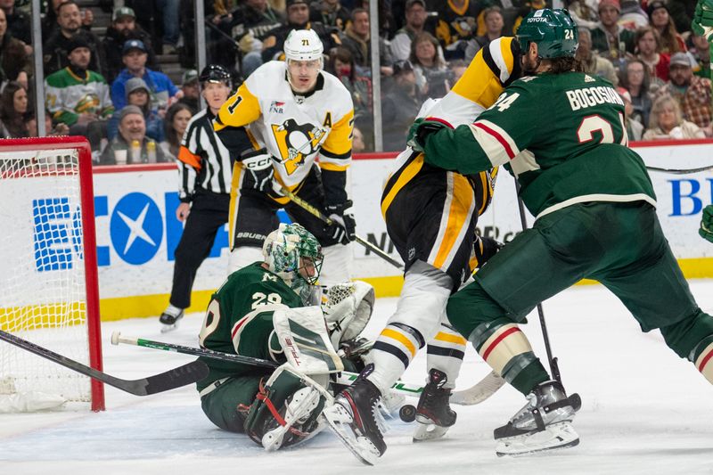 Feb 9, 2024; Saint Paul, Minnesota, USA; Minnesota Wild goaltender Marc-Andre Fleury (29) makes a save with a crown in front in the third period at Xcel Energy Center. Mandatory Credit: Matt Blewett-USA TODAY Sports