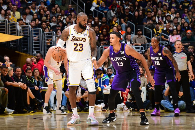 LOS ANGELES, CA - OCTOBER 26: LeBron James #23 of the Los Angeles Lakers dribbles the ball during the game against the Sacramento Kings on October 26, 2024 at Crypto.Com Arena in Los Angeles, California. NOTE TO USER: User expressly acknowledges and agrees that, by downloading and/or using this Photograph, user is consenting to the terms and conditions of the Getty Images License Agreement. Mandatory Copyright Notice: Copyright 2024 NBAE (Photo by Adam Pantozzi/NBAE via Getty Images)