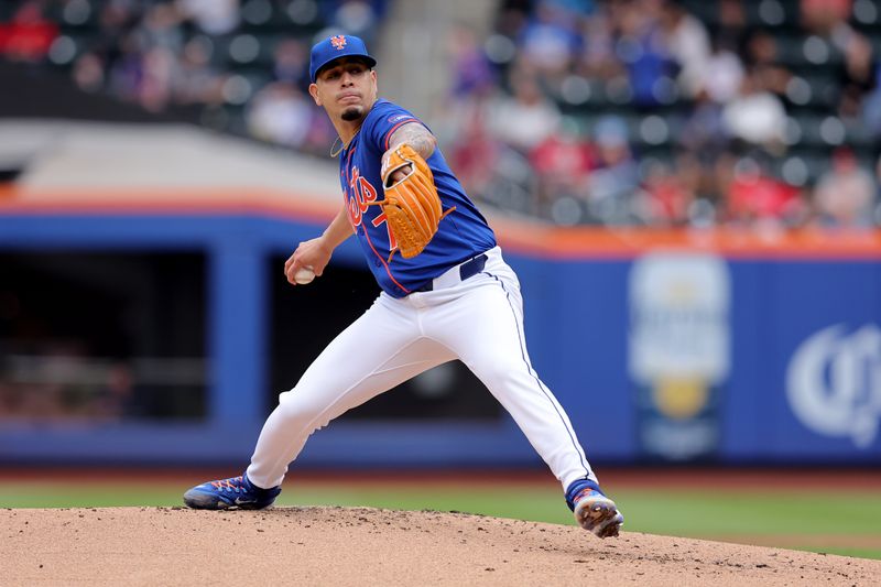 May 14, 2024; New York City, New York, USA; New York Mets starting pitcher Jose Butto (70) pitches against the Philadelphia Phillies during the second inning at Citi Field. Mandatory Credit: Brad Penner-USA TODAY Sports