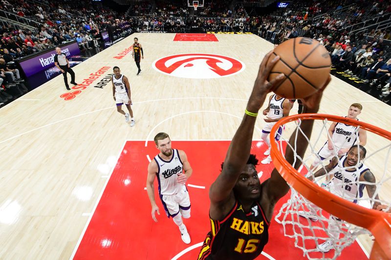 ATLANTA, GA - NOVEMBER 1: Clint Capela #15 of the Atlanta Hawks dunks the ball during the game against the Sacramento Kings on November 1, 2024 at State Farm Arena in Atlanta, Georgia.  NOTE TO USER: User expressly acknowledges and agrees that, by downloading and/or using this Photograph, user is consenting to the terms and conditions of the Getty Images License Agreement. Mandatory Copyright Notice: Copyright 2024 NBAE (Photo by Adam Hagy/NBAE via Getty Images)