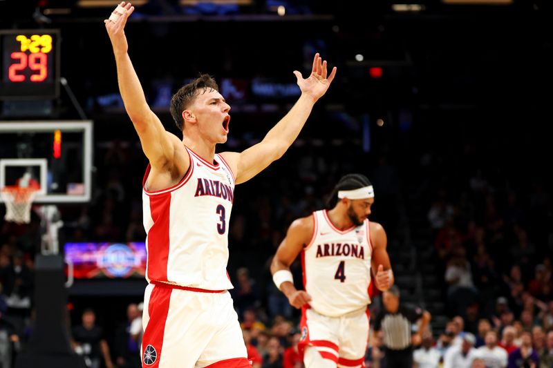 Dec 20, 2023; Phoenix, Arizona, USA; Arizona Wildcats guard Pelle Larsson (3) celebrates after a play during the second half of the game against the Alabama Crimson Tide in the Hall of Fame Series at Footprint Center. Mandatory Credit: Mark J. Rebilas-USA TODAY Sports