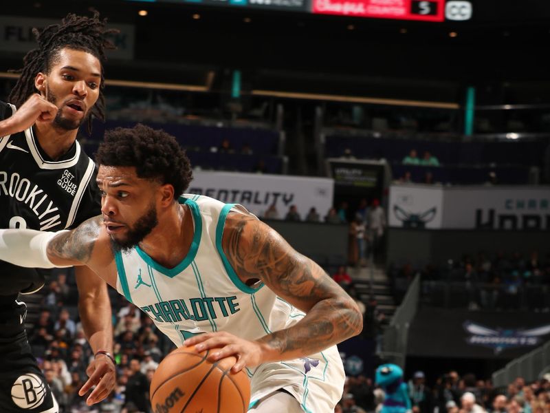 CHARLOTTE, NC - JANUARY 29:  Miles Bridges #0 of the Charlotte Hornets dribbles the ball during the game against the Brooklyn Nets on January 29, 2025 at Spectrum Center in Charlotte, North Carolina. NOTE TO USER: User expressly acknowledges and agrees that, by downloading and or using this photograph, User is consenting to the terms and conditions of the Getty Images License Agreement. Mandatory Copyright Notice: Copyright 2025 NBAE (Photo by Kent Smith/NBAE via Getty Images)