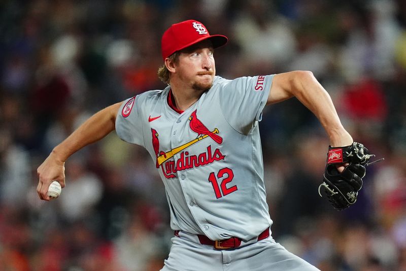 Sep 25, 2024; Denver, Colorado, USA; St. Louis Cardinals starting pitcher Erick Fedde (12) delivers a pitch in the eighth inning against the Colorado Rockies at Coors Field. Mandatory Credit: Ron Chenoy-Imagn Images